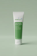 Tube of Dermaspa moisturizing repair cream on a light green background